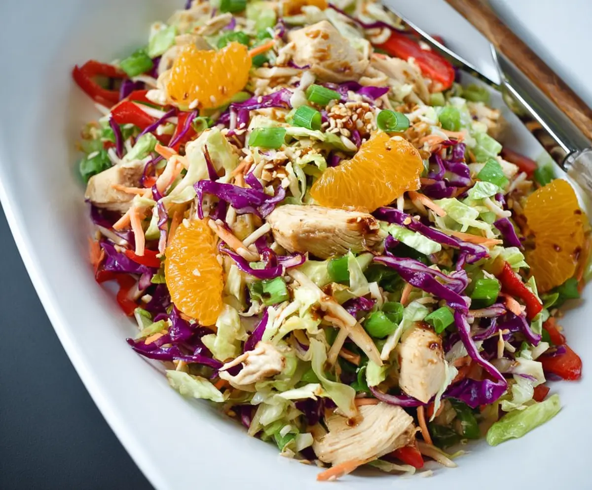 Colorful Chinese Chicken Chopped Salad with fresh vegetables and tender chicken pieces